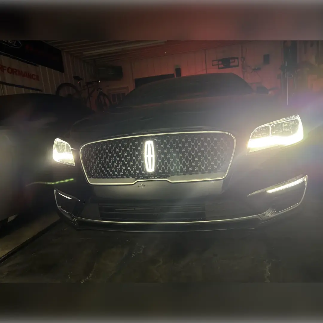 Lincoln Continental light up emblem installed — night view,