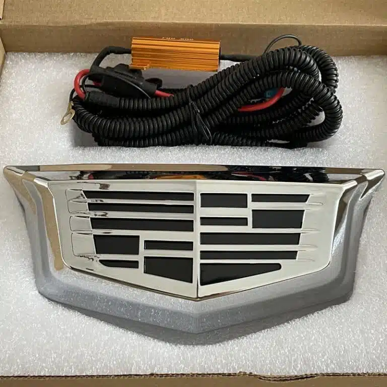 Cadillac XT5 LED emblem — black finish, white LED, front grille